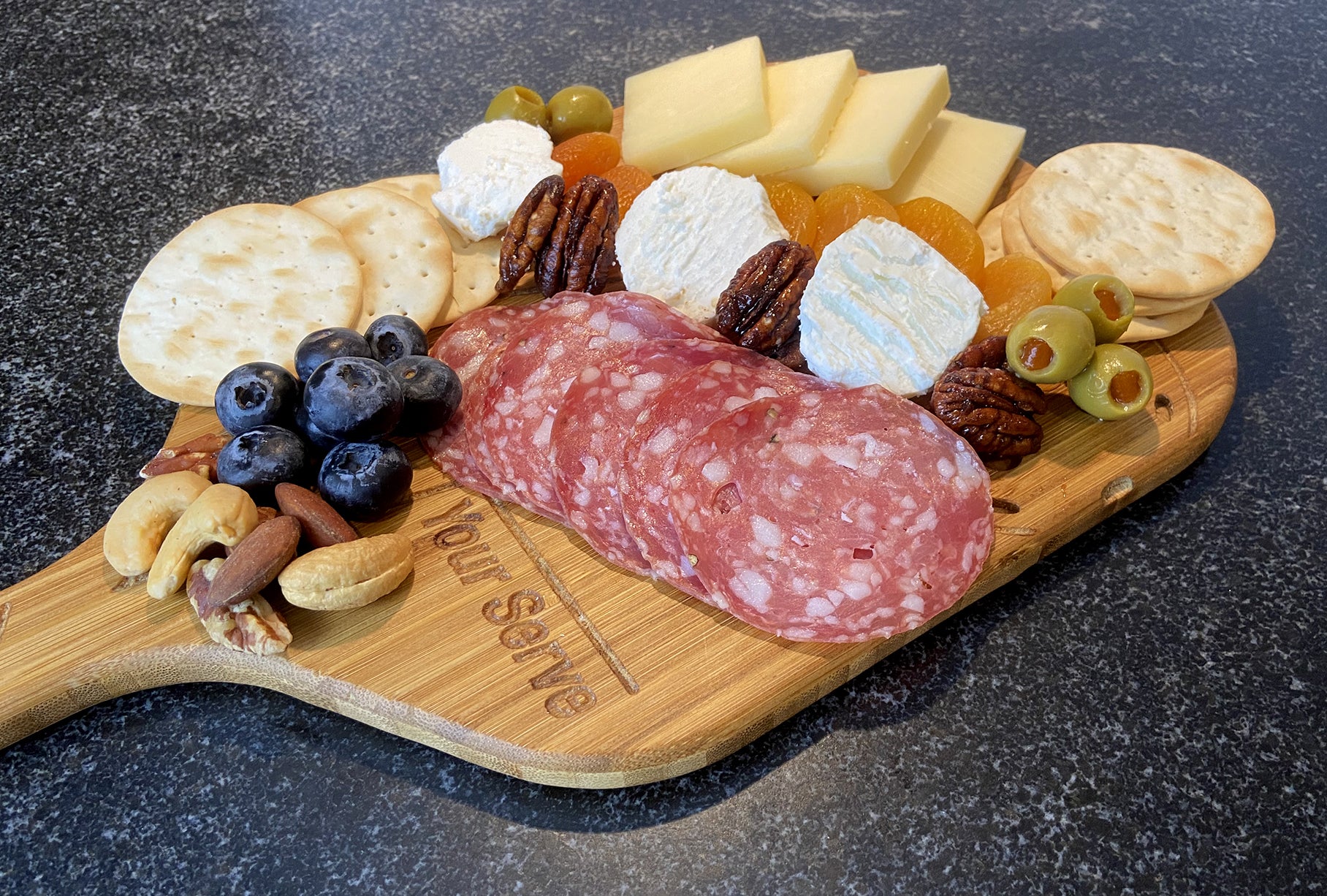 pickleball paddle shaped cheese board